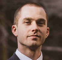 Thomas Whitfield analista de trading retrato experto en mercado cripto